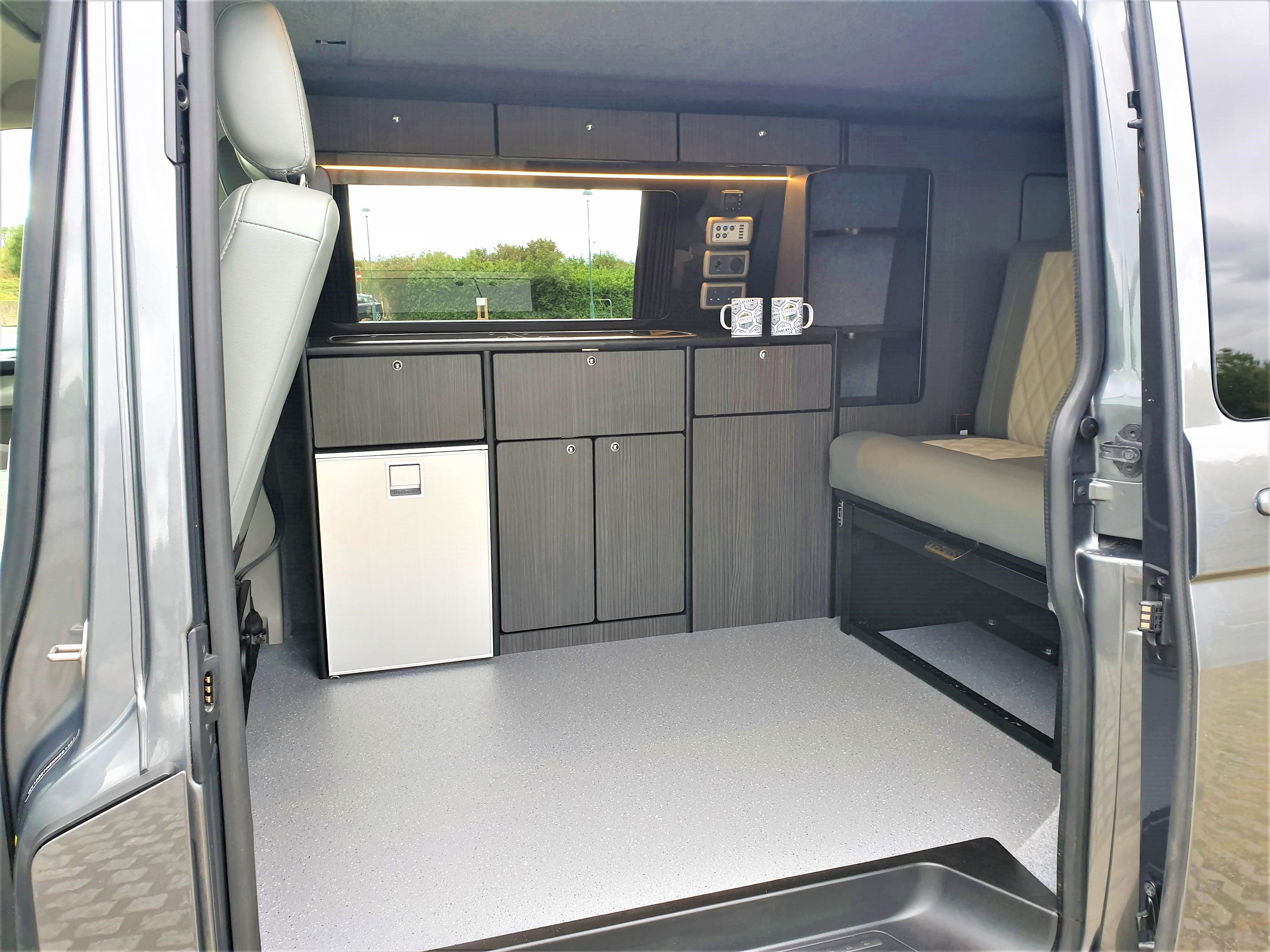 Van Conversion with Accessories Including Fridge and Lighting